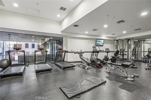 exercise room with recessed lighting and visible vents