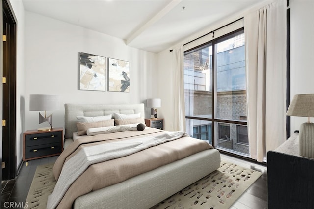bedroom featuring wood finished floors