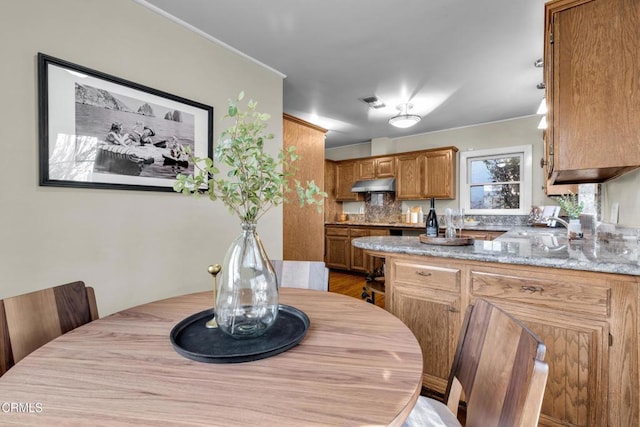 dining space featuring visible vents