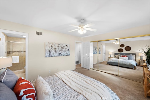 bedroom with light carpet, ensuite bath, and visible vents