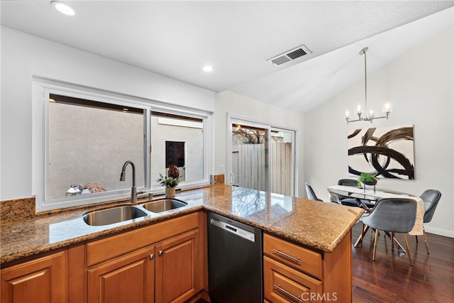 kitchen with a peninsula, a sink, visible vents, brown cabinets, and dishwasher