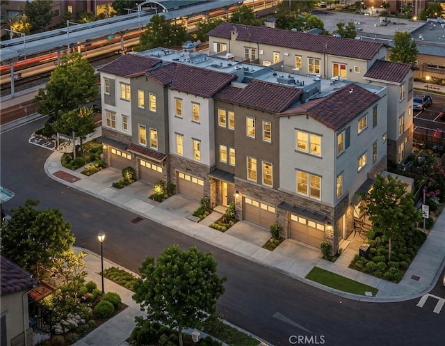 aerial view at dusk with a residential view