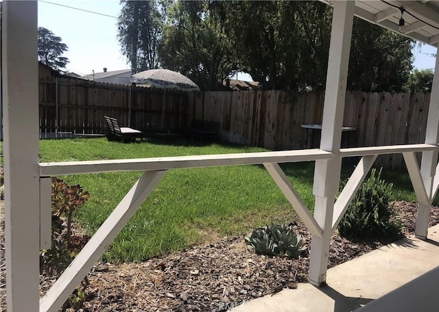 view of yard with a fenced backyard