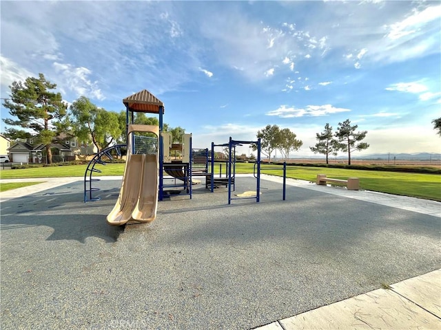 communal playground with a lawn