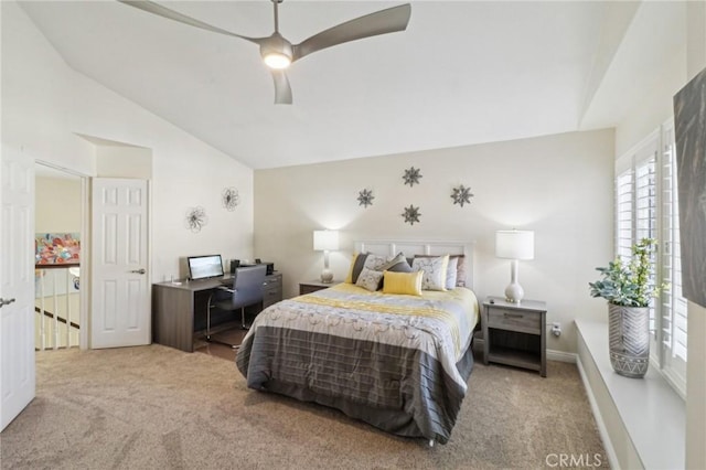 bedroom featuring lofted ceiling, carpet floors, a ceiling fan, and baseboards