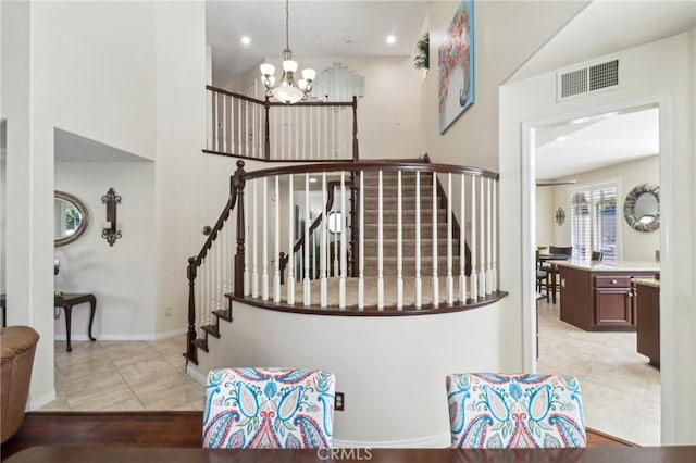 stairs featuring baseboards, visible vents, tile patterned floors, a notable chandelier, and recessed lighting