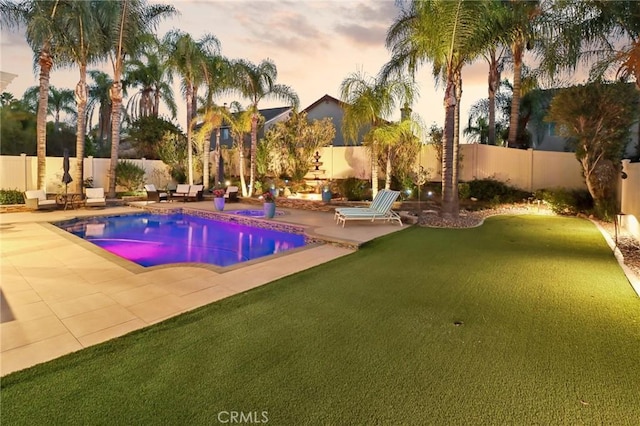 view of pool with a fenced in pool, a patio area, and a fenced backyard