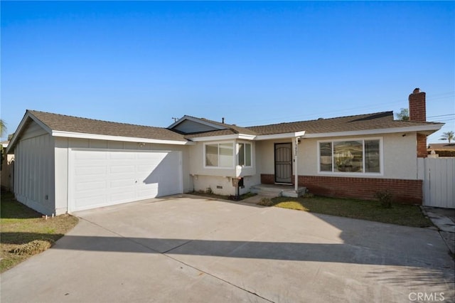 single story home with a garage, brick siding, fence, driveway, and a chimney