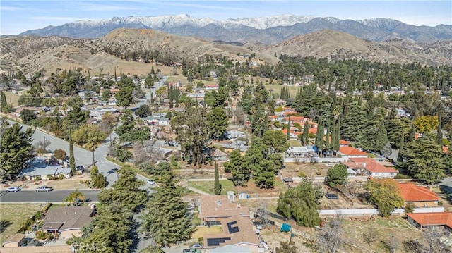 birds eye view of property with a residential view and a mountain view