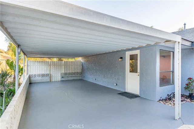 view of patio featuring fence