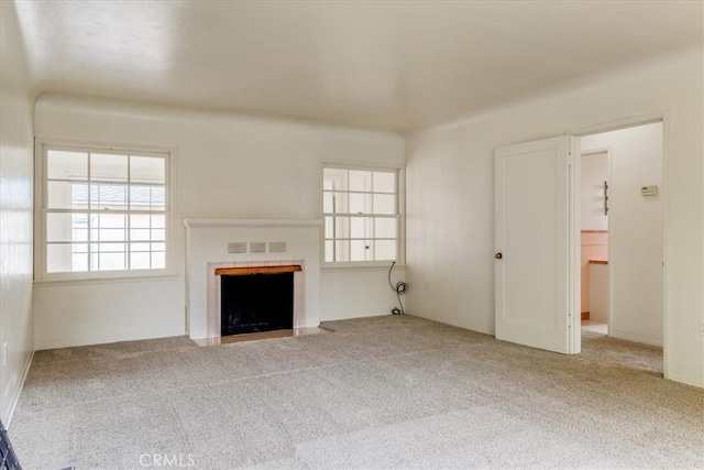 551 Hathway Ave, San Luis Obispo, CA 93405 - unfurnished living room featuring a tiled fireplace, visible vents, and carpet