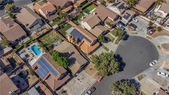 birds eye view of property with a residential view