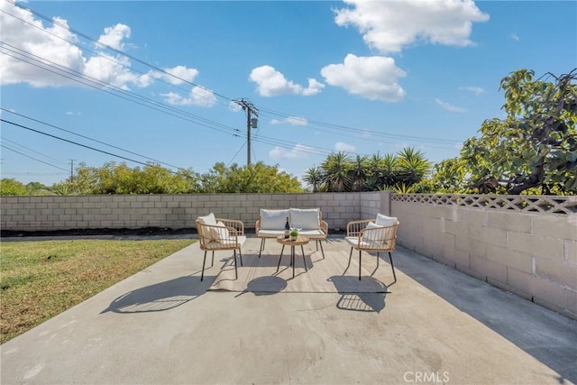 view of patio / terrace with an outdoor hangout area and a fenced backyard