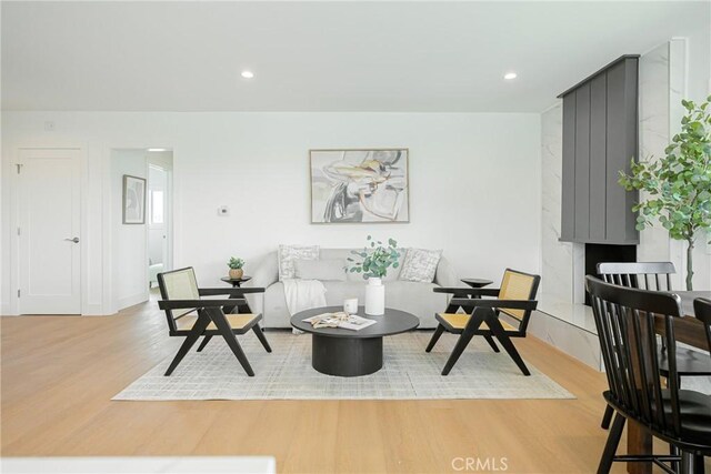 living room featuring light wood-style floors and recessed lighting