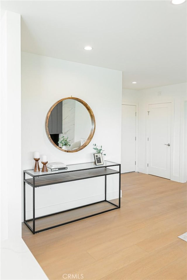 hall featuring recessed lighting and light wood-style floors