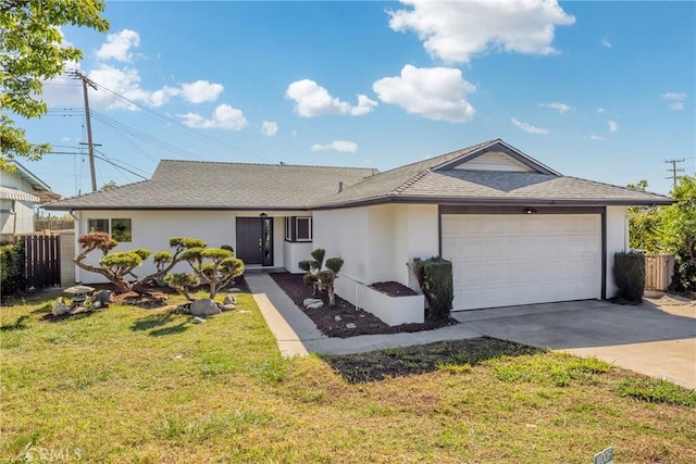 ranch-style home featuring concrete driveway, a front lawn, an attached garage, and stucco siding