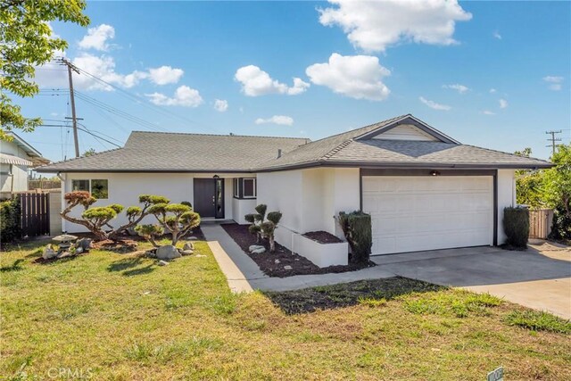 ranch-style house featuring a front yard, a garage, fence, concrete driveway, and stucco siding