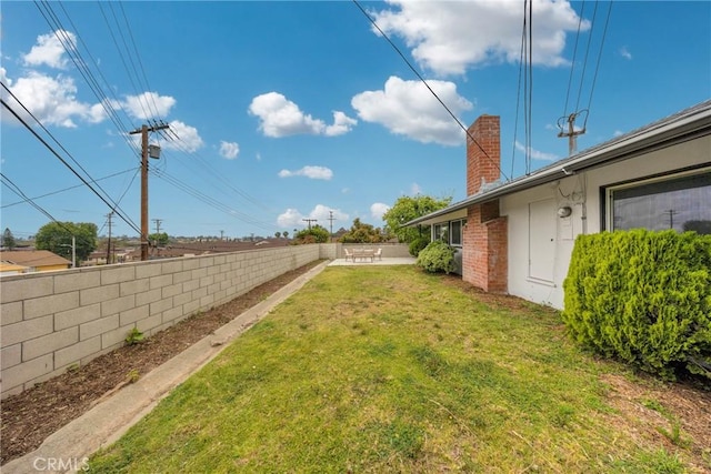 view of yard with fence