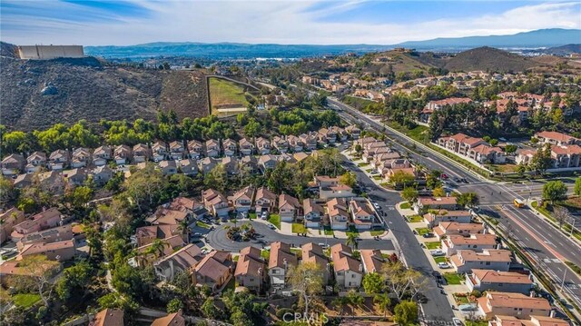 bird's eye view featuring a mountain view and a residential view