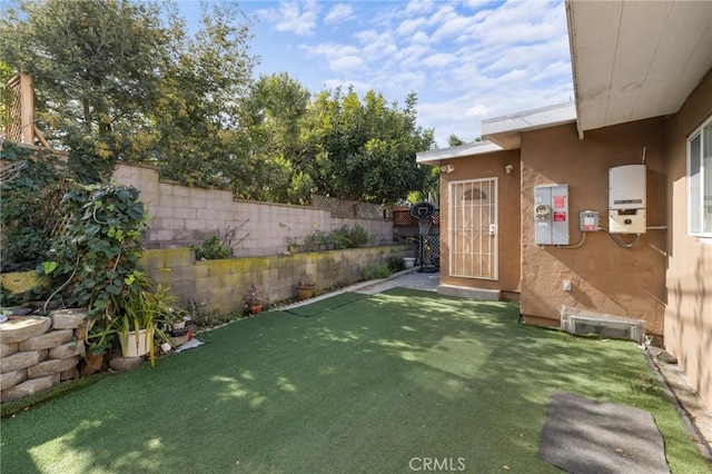 view of yard featuring a fenced backyard