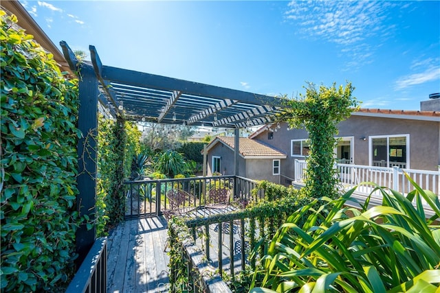 balcony featuring a pergola