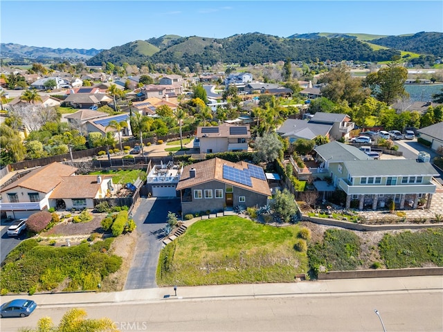 birds eye view of property with a residential view and a mountain view