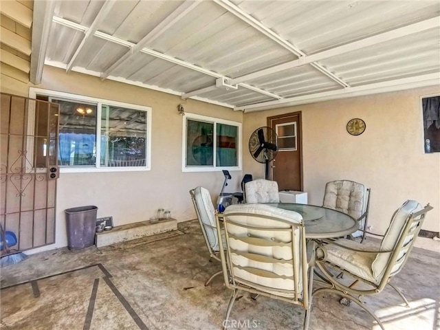 view of patio featuring outdoor dining area