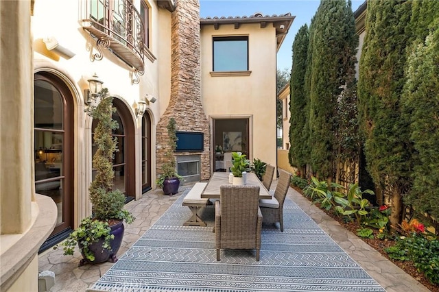 view of patio / terrace with a balcony