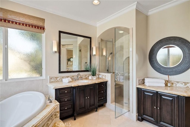 full bathroom with a garden tub, crown molding, a stall shower, vanity, and tile patterned flooring