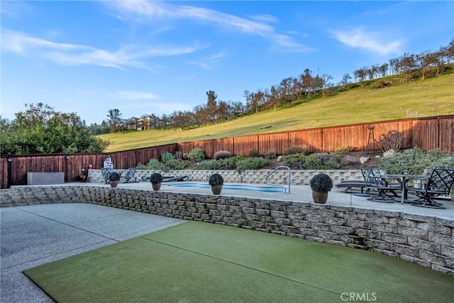 view of patio featuring a fenced backyard