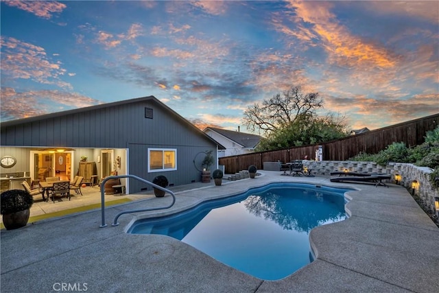 view of swimming pool with a fenced in pool, a patio area, and a fenced backyard