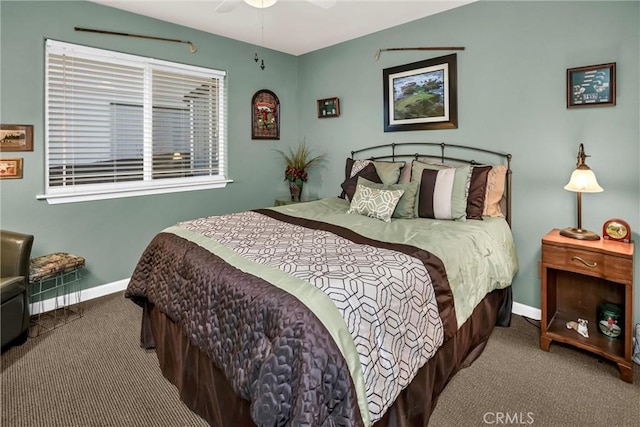 bedroom featuring a ceiling fan, carpet flooring, and baseboards