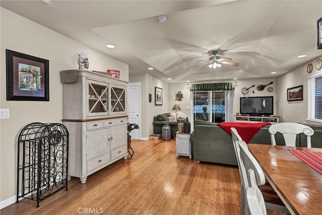 living area featuring a ceiling fan, recessed lighting, baseboards, and wood finished floors