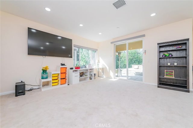 rec room with light colored carpet, visible vents, and recessed lighting