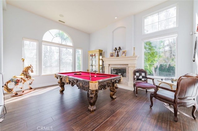 playroom with baseboards, visible vents, hardwood / wood-style flooring, a premium fireplace, and pool table