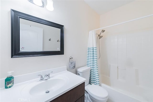 bathroom featuring toilet, shower / tub combo, and vanity