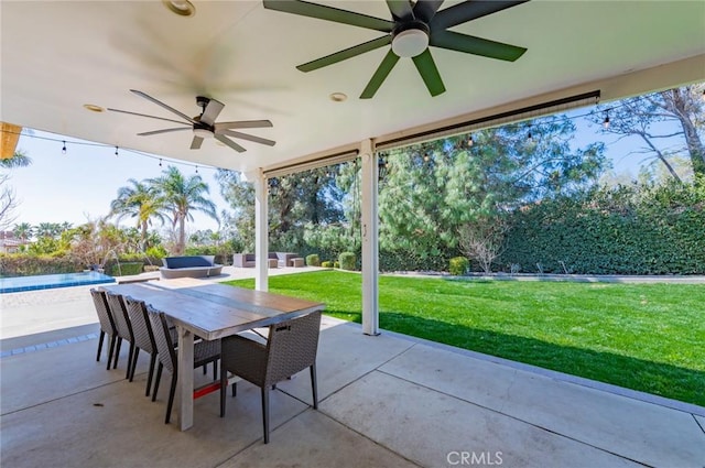 view of patio featuring outdoor dining space, an outdoor pool, and an outdoor hangout area