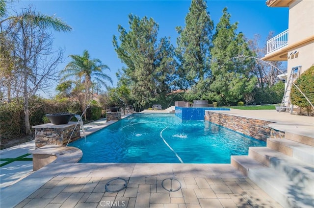 pool with a patio