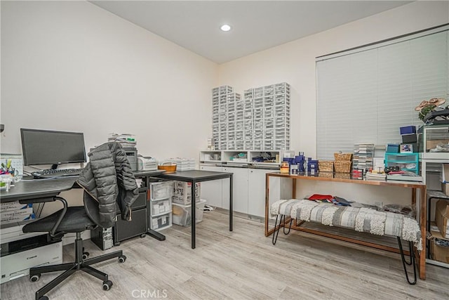 home office with wood finished floors and recessed lighting