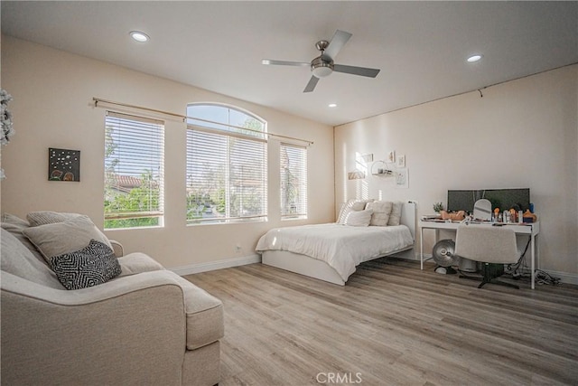 bedroom featuring recessed lighting, ceiling fan, baseboards, and wood finished floors