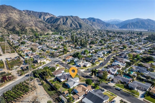 birds eye view of property featuring a residential view and a mountain view