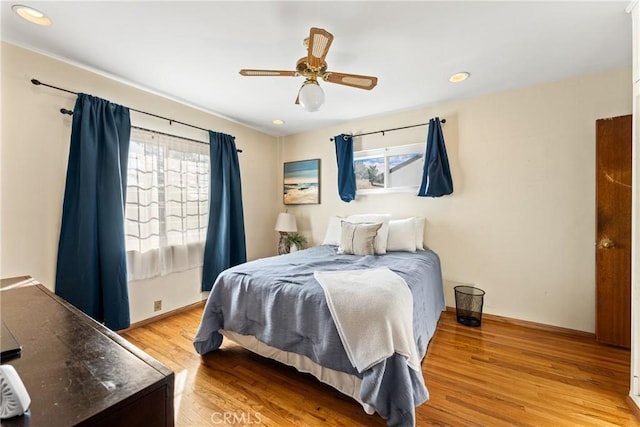 bedroom with baseboards, ceiling fan, recessed lighting, and light wood-style floors