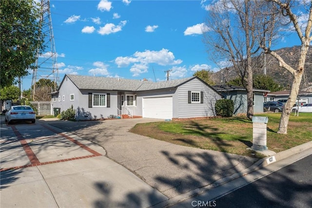 single story home featuring driveway, roof with shingles, an attached garage, a front lawn, and stucco siding