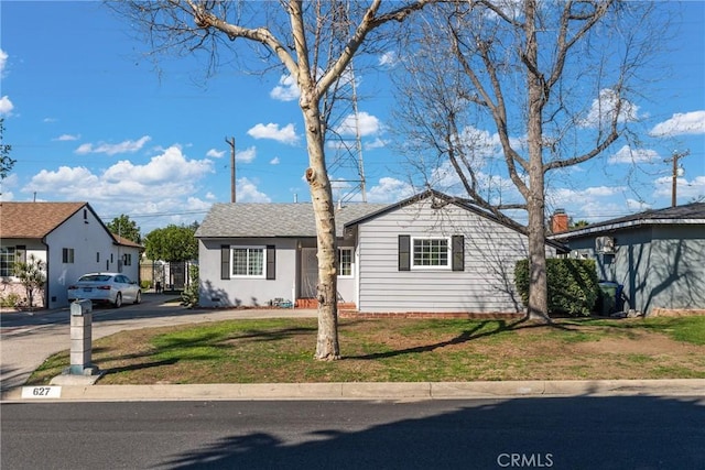 view of front of home with a front yard