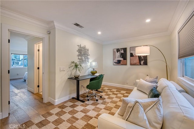 office space featuring visible vents, baseboards, ornamental molding, light wood-type flooring, and recessed lighting
