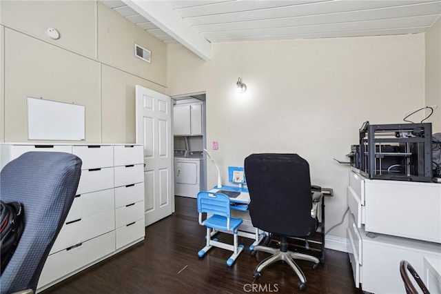 office area featuring lofted ceiling with beams, washer / dryer, dark wood-style floors, and visible vents