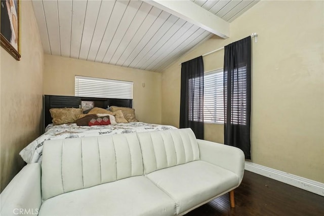 bedroom with wood ceiling, dark wood finished floors, lofted ceiling with beams, and baseboards