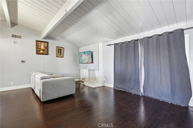 sitting room featuring dark wood-style floors, visible vents, lofted ceiling with beams, and baseboards