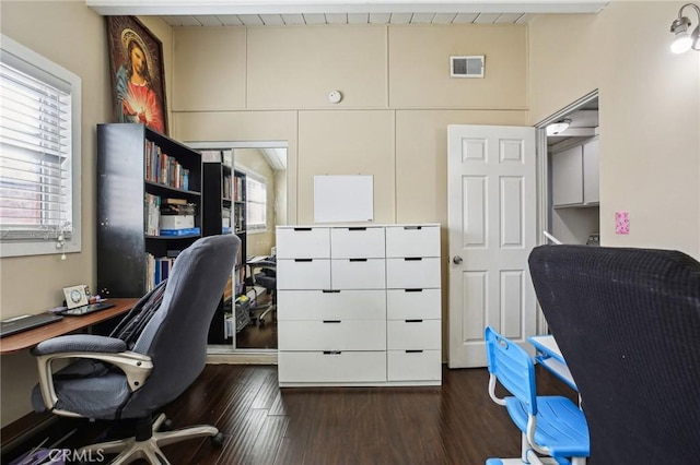 office space featuring visible vents and dark wood finished floors