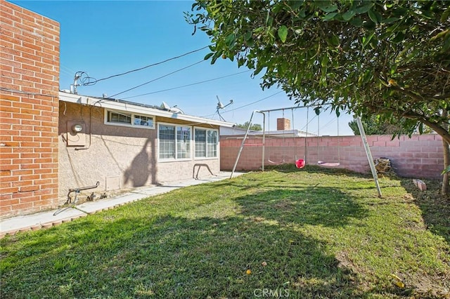 view of yard featuring a fenced backyard